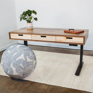 The Evolve Electric Adjustable Standing Desk with the Venn Design air chair